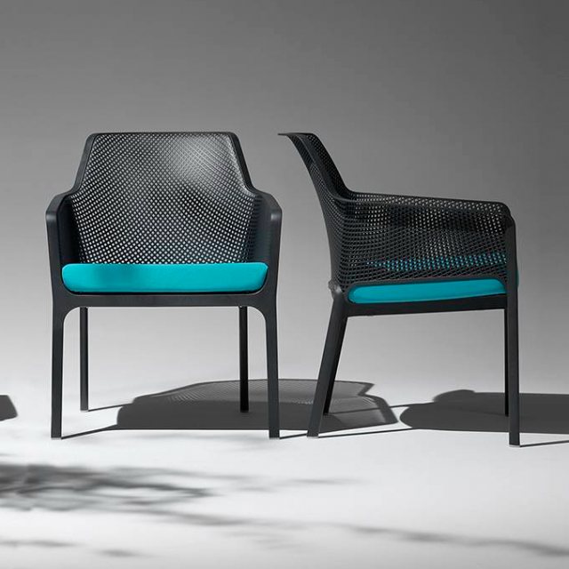 Nardi Net outdoor armchairs with turquoise seat pads