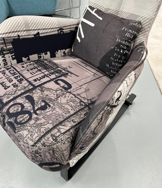 Fama Kangou rocking armchair with footstool