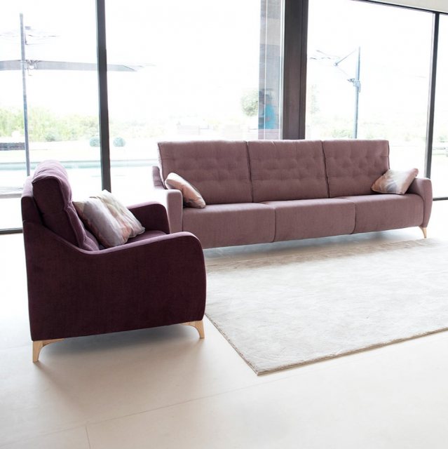 Reclining sofa with lumbar support