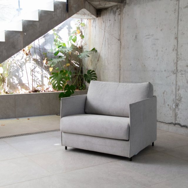 Fama Sheldon space-saving chair bed
