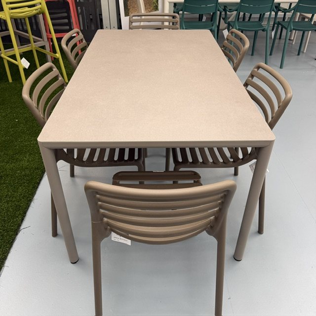 Nardi Doga Bistrot Tabacco chairs arranged around an outdoor dining table