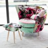 Feature swivel chair with footstool