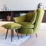 Fama Volta swivel chair with footstool